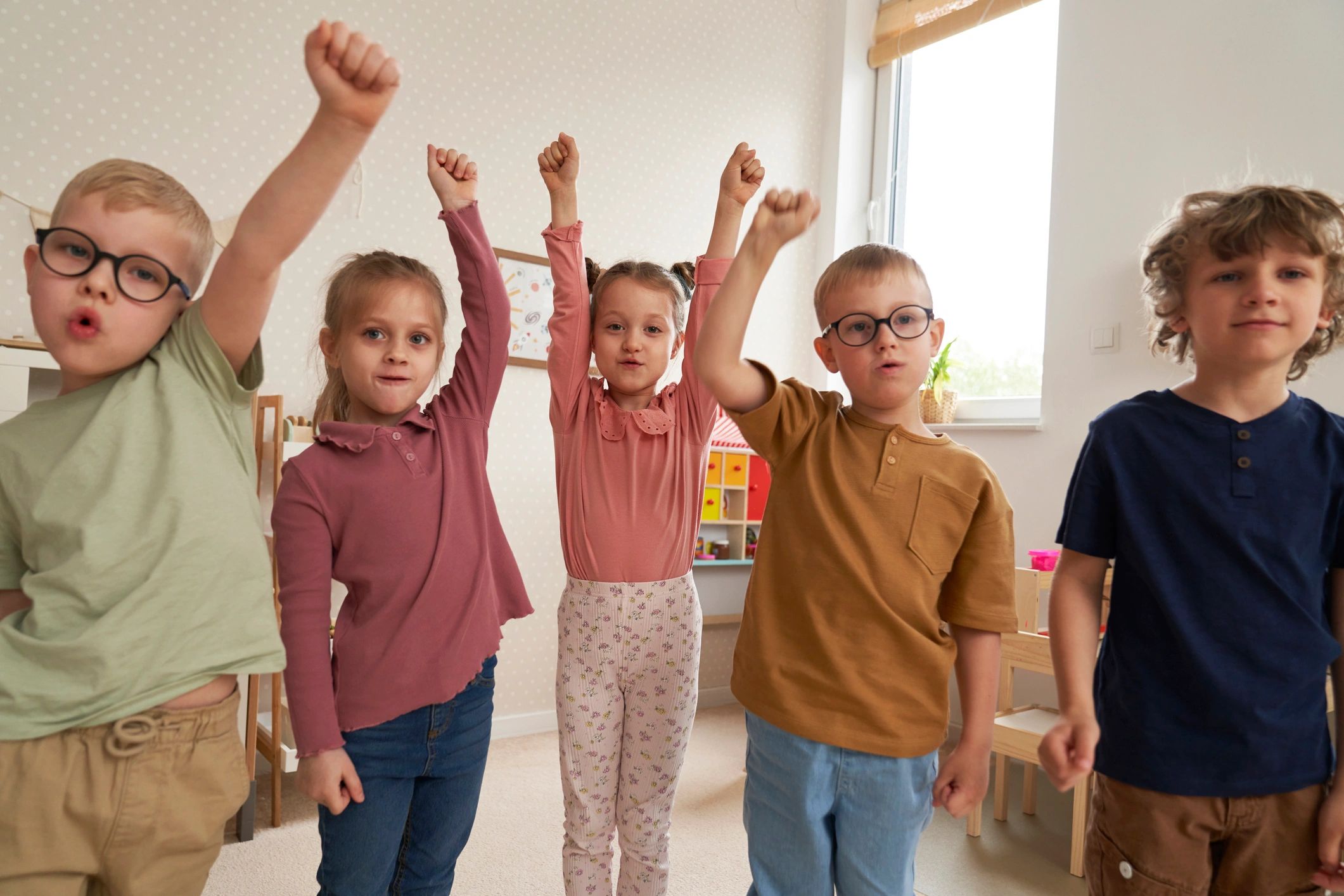 Preschool children participating in a class activity